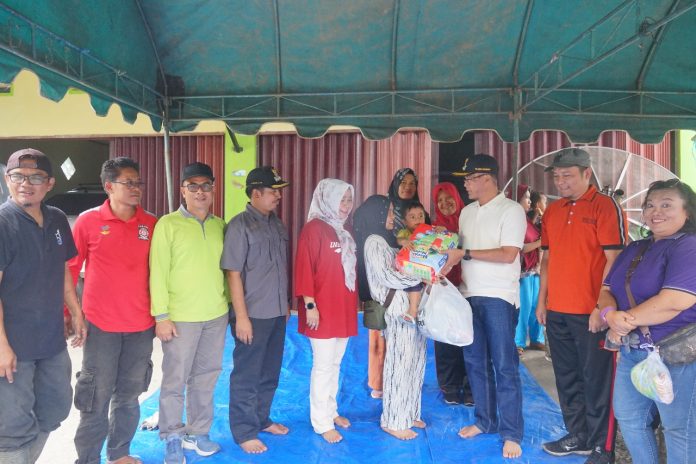 Pj. Walikota Payakumbuh Hantarkan Bantuan Kembali